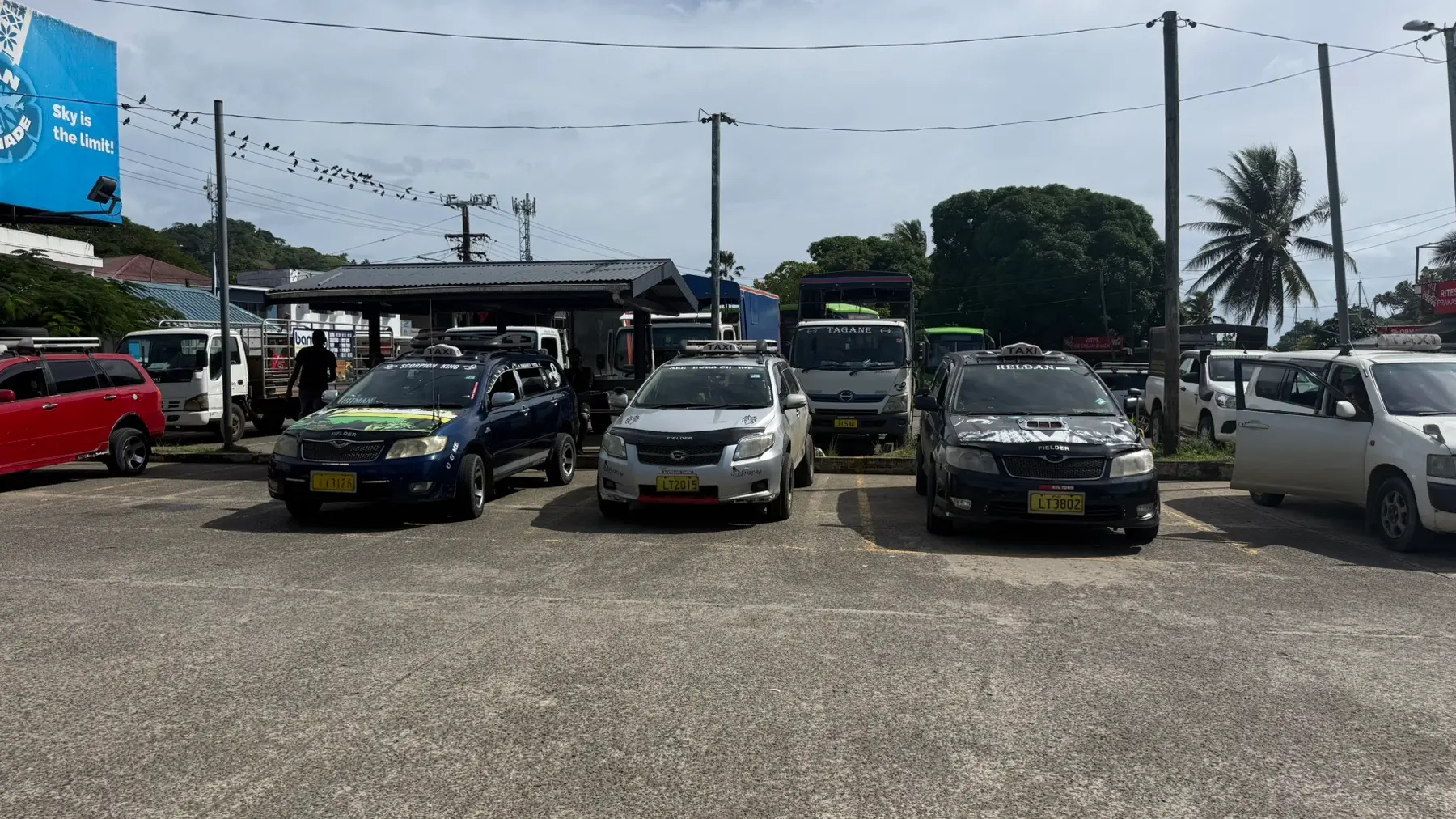 Taxi drivers await jobs at the Savusavu Town taxi base.