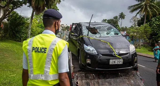 Police officers transport the vehicle that was part of the early morning attack against a group of youths in Raiwai on August 14, 2022. Photo: Leon Lord