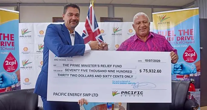 Pacific Energy chief executive officer Randall Vallette with Prime Minister Voreqe Bainimarama.