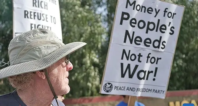 A protester is seen in front of Marine Corps Air Station Miramar, 25 kilometers north of downtown San Diego, California, the United States, March 18, 2023. Anti-war organisations held rallies in Los Angeles and San Diego on Saturday in the run-up to the 20th anniversary of the U.S. invasion of Iraq, which started on March 20, 2003.