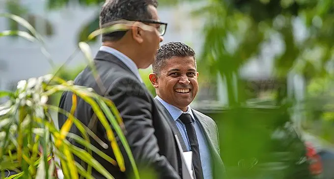 Defence lawyer Devanesh Sharma and former Supervisor of Elections Mohammed Saneem outside the Suva Magistrate’s Court on August 27, 2024. Photo: Leon Lord