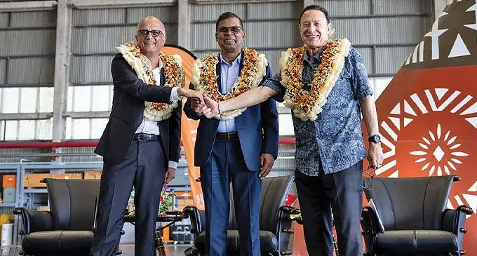From left: Fiji Airways board chairman Nalin Patel, Deputy Prime Minister and Minister for Finance Biman Prasad and Fiji Airways managing director and chief executive officer André Viljoen celebrate the national airline’s record breaking achievement on May 9, 2024. Photo: Fiji Airways
