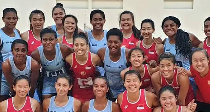 Fijian Pearls and Singapore netball teams in Singapore on April 27,2019. Photo: Netball Singapore
