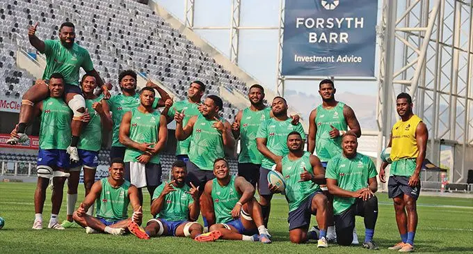 Swire Shipping Fijian Drua players (standing from left) Elia Canakaivata carries Samuela Tawake, Vilive Miramira, Isoa Nasilasila, Zuriel Togiatama, Meli Derenalagi (captain), Meli Tuni, Emosi Tuqiri, Jone Tiko, Sorovakatini Tuifagalele, Tuidraki Samusamuvodre. Front (from left) Kitione Salawa, Joseva Tamani, Leone Rotuisolia, Mesulame Dolokoto, Tevita Ikanivere after the captain’s run at the Forsyth Barr Stadium in Dunedin, New Zealand, on March 24, 2023.  Photo: Fijian Drua Media