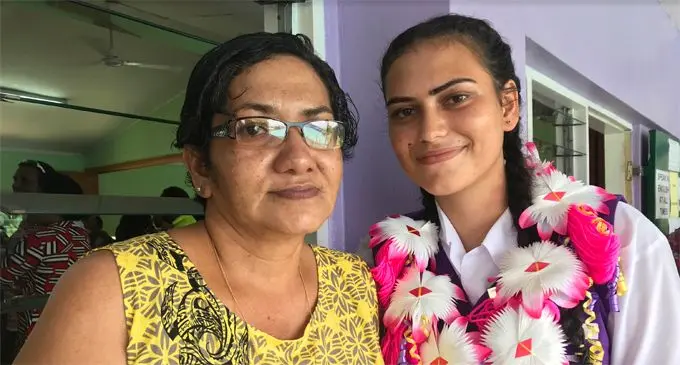 Jasper Williams High School headgirl Surava Tausie Pau’u with her mum, Fuata Pau’u. Photo: Lusi Banuve