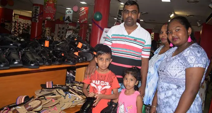 The Lal family of Caubati doing their back to school shopping at Deluxe footware. Photo: Simione Haravanua.