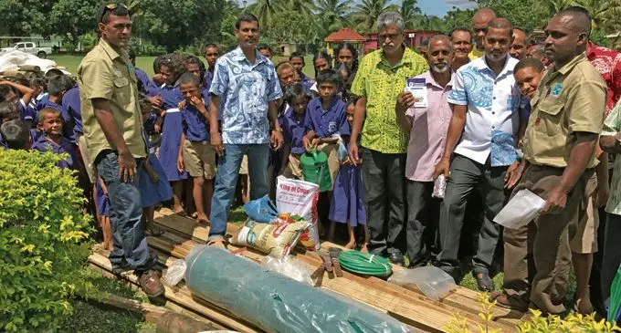 Assistant Minister for Agriculture Viam Pillay with students and teachers of Lagalaga Sanatan Primary School and local rice farmers during the handing over of nursery materials at the school on February 23, 2018. Photo: Shratika Naidu