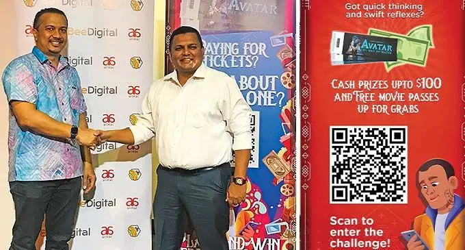 Founder of Bee Digital and Chief Executive Officer Rizvi Amith with Damodar Group of Companies chief executive officer Div Damodar during the launch of the first mobile IMI Games in Fij at the Cinelounge on December 20,2022. Photo: Laisa Lui