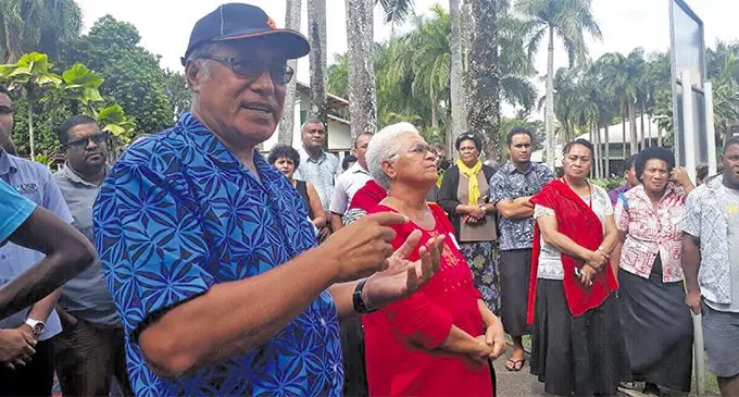 School of Social Sciences Associate Professor Morgan Tuimalealiifano [left] talking to the crowd at USP.