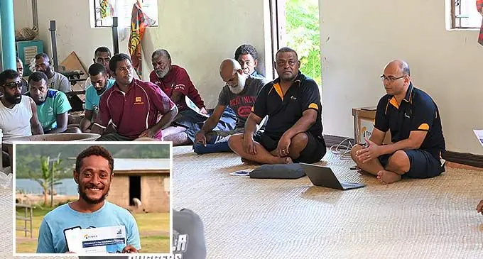 Tower head of Pacific Digital Distribution Veilawa Rereiwasaliwa and Tower Fiji country manager Joseph Magnus Inset: Mosese Saumaki, a new Tower customer as part of the Tower Cyclone Response Cover Roadshow in Kavala Village. Photo: Tower Insurance