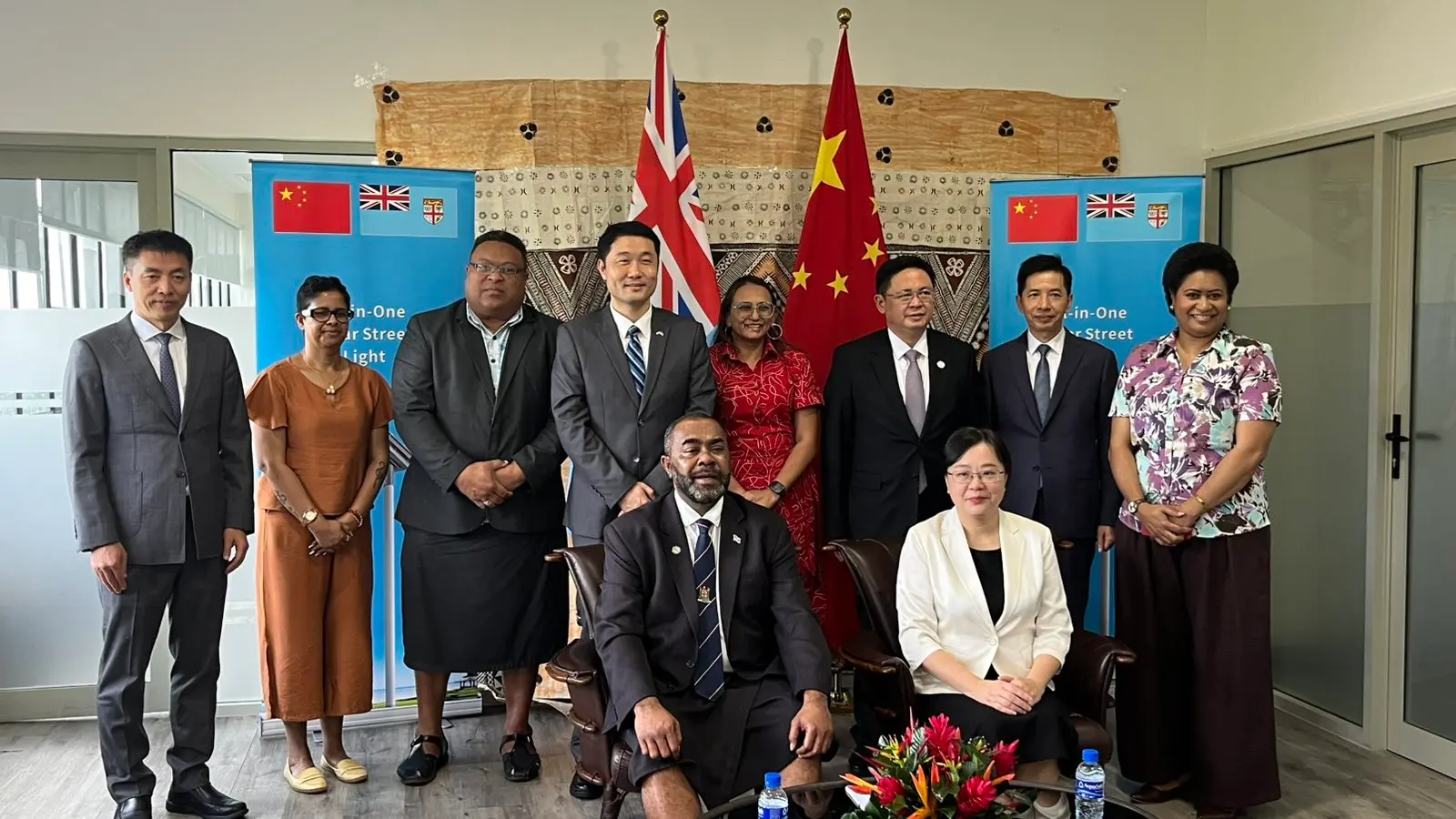 (Seated from left) Acting Minister for Housing and Local Government, Hon. Mosese Bulitavu, and Guangdong Province Vice Governor Zhang Guozhi with representatives from the Embassy of the People's Republic of China and the Ministry of Housing and Local Government during the handover of solar lights on September 15, 2026.
