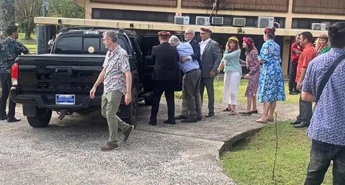He was later helped by officials to a waiting car where he was transported to hospital and treated for dehydration. Photo: ABC