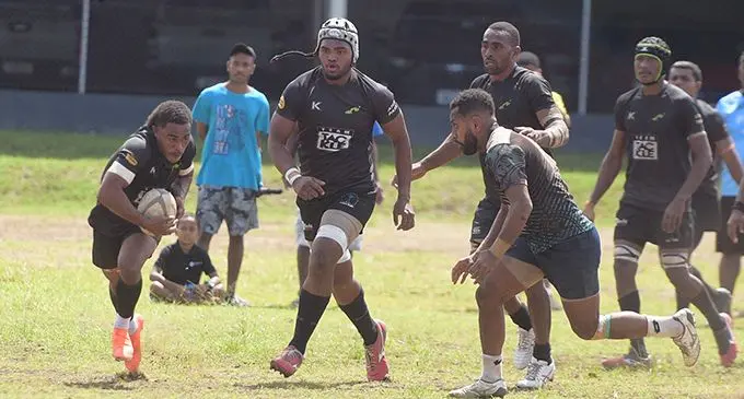 Atonio Delailoa (right) of USP comes in for a tackle against Kadavu at the Marist Brothers High School ground in Suva on August 26, 2023. Photo: Ronald Kumar  