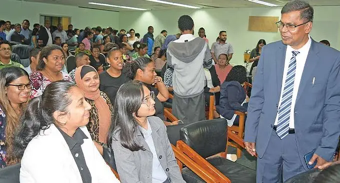 Minister for Finance Biman Prasad (right) while meeting his office staff during the official welcome ceremony on December 28, 2022. Photo: Ronald Kumar
