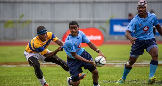 Action between Queen Victoria School and Ratu Kadavulevu School in the Under-15 final at Churchill Park, Lautoka, this morning. Photo: Leon Lord 