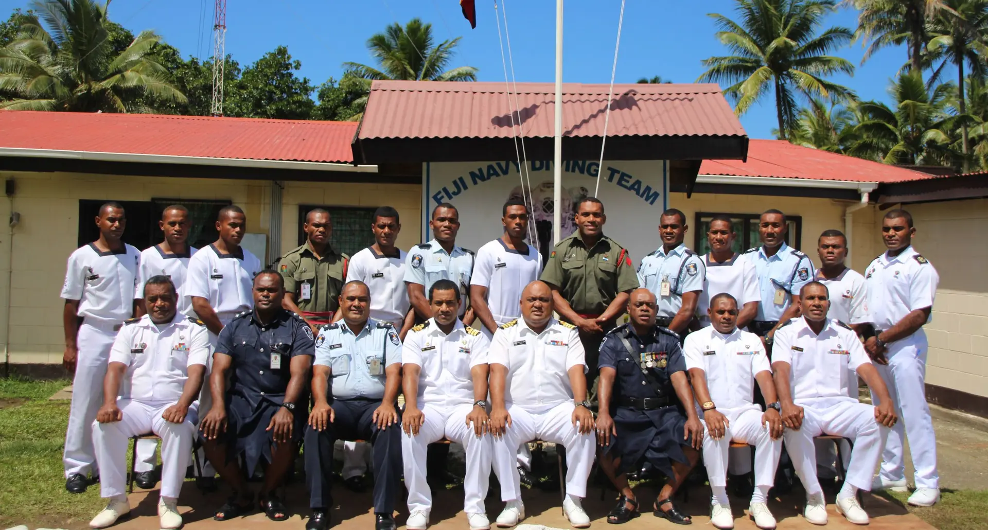 The office of the Republic of Fiji Military Forces (RFMF) Navy Captain (Navy) Humphrey Tawake (sitting fifth from left) with the divers at the back. Photo: RFMF Navy