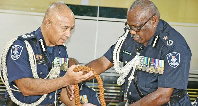 Over to you...Outgoing Acting Police Commissioner Juki Fong Chew officially hands over the reigns to new Commissioner of Police Rusiate Tudravu on February 3, 2025. Photo: Ronald Kumar