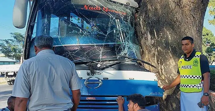 A Police officer at the scene of the bus accident at the Natabua Road junction in Lautoka on July 10, 2023. Photo: Salote Qalubau