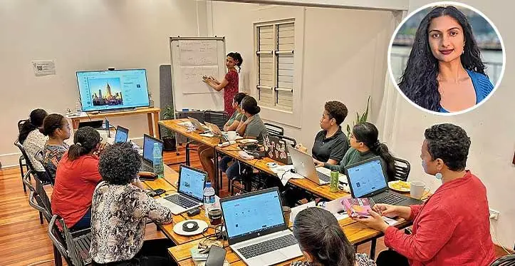 Shenal Harakh instructing a group of workshop participants on building websites. Photo: Kris Prasad