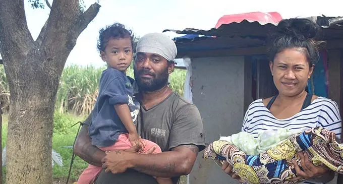Adrian Koroi and his wife, Maraia Sokulavou with their two year-old-son, Mosese Koroi and two-weeks-old baby girl, Grace Koroi.