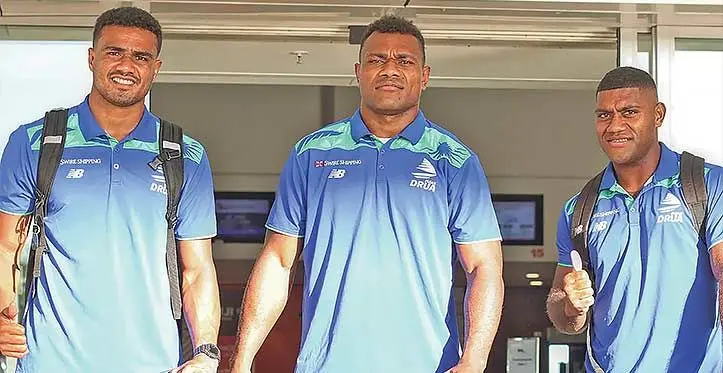Swire Shipping Fijian Drua players from left Iosefo Masi, Elia Canakaivata and Peni Matawalu at Nadi Airport before leaving for Canberra on April 12, 2023. Photo: Fijian Drua