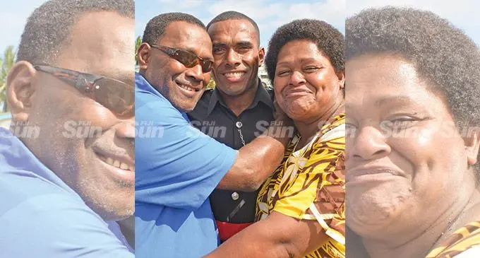 Former National 7’s rep, Police Constable Terio Tamani with parents Apisai Ratu and Bulou Vara following the Fiji Police Force batch 63 passing out parade at Police Nasova grounds on June 24, 2022. Photo: Ronald Kumar