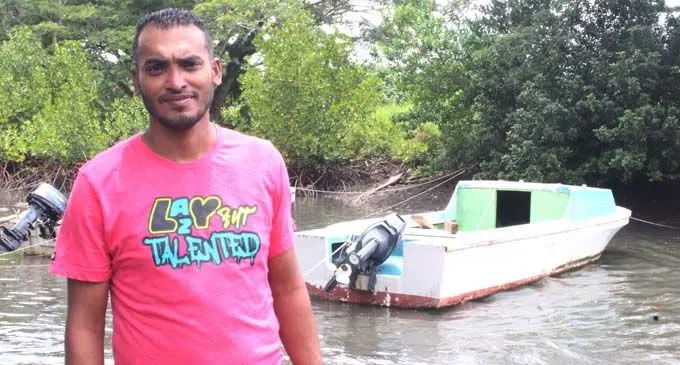 Elvin Kumar with his fishing boat in Savusavu. Photo: Wati Talebula