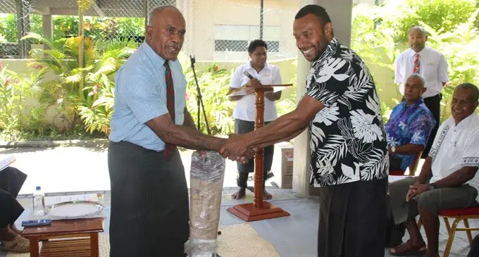 Minister for Youth and Sports Laisenia Tuitubou handing over farming tools to Viliame Cakacaka on February 23, 2018.  Photo: Ministry of Youth and Sport