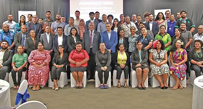 Deputy Prime and Minister and Minister for Trade, Cooperatives, Small and Medium Enterprises, and Communications, Manoa Kamikamica with participants at the first National Scams Awareness Week. Photo: Consumer Council of Fiji