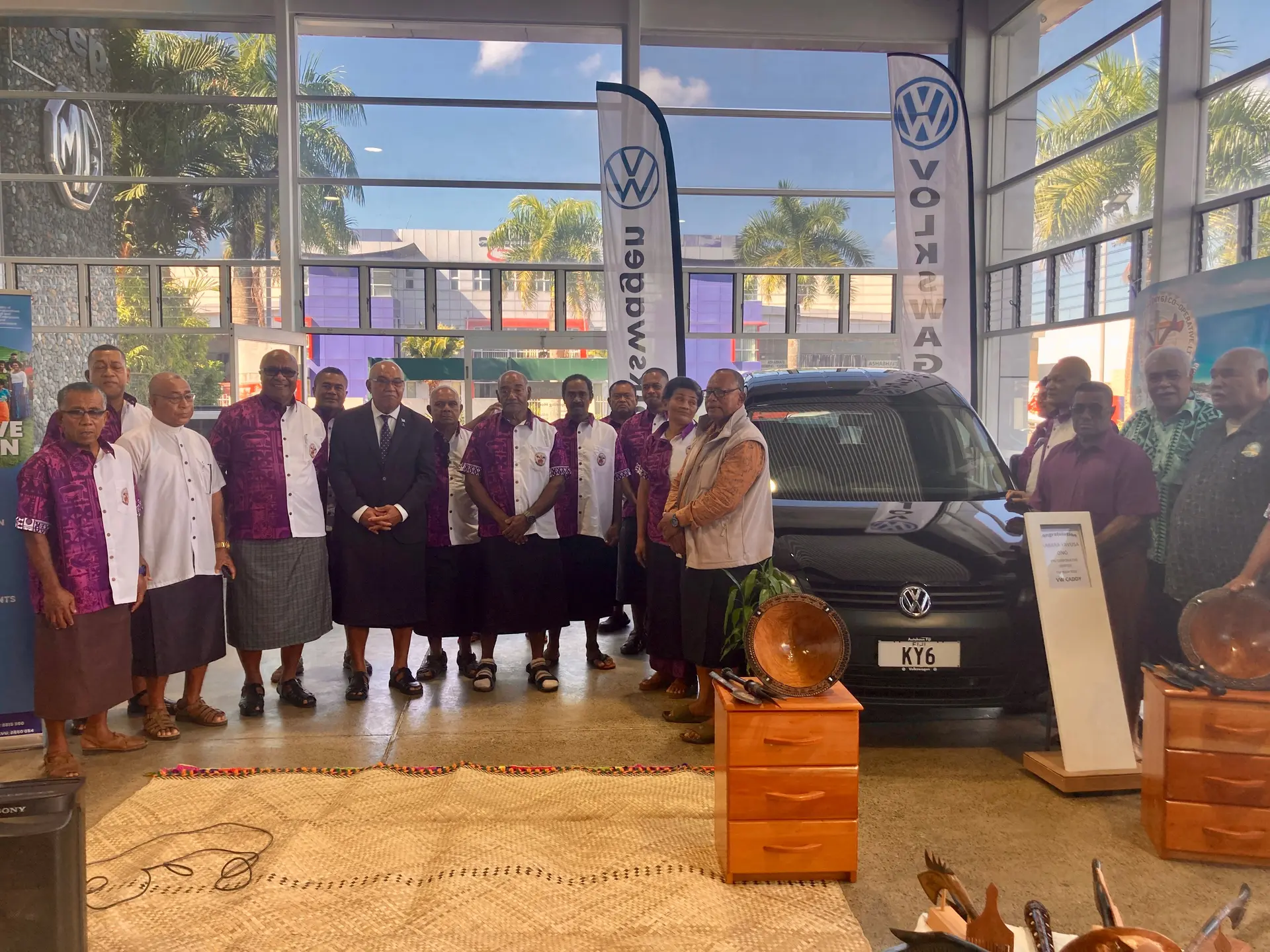 Kabara Yavusa Ono Cooperative members with Deputy Prime Minister Manoa Kamikamica (fourth from left) and Speaker of Parliament, Filimone Jitoko (centre).