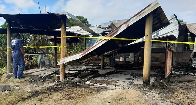 A firefighter from the National Fire Authority inspecting the home  on July 6, 2019.  Photo: Nicolette Chambers 