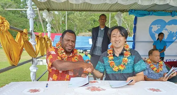 KOICA Fiji Country Director a Kap-chae Ra and the Chief of Mission for IOM Fiji Solomon Kantha sign the Funding Agreement at CATD Nadave in Tailevu in commemoration of the World Humanitarian Day.