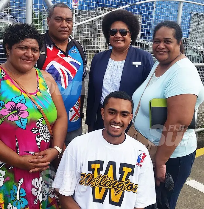 Soko Vakacegu (standing right) with relatives at Narain Jetty waiting for her trip on Princess Moana to Ogea, Lau. Photo: Maika Bolatiki.