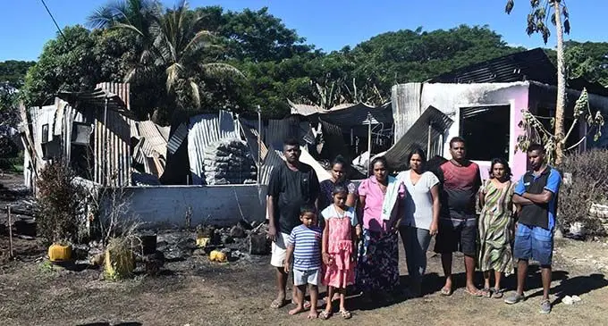 Sada Siwan (third from right) with his family in front of their home in Lovu Seaside in Lautoka on June 16, 2019.  Photo: Waisea Nasokia