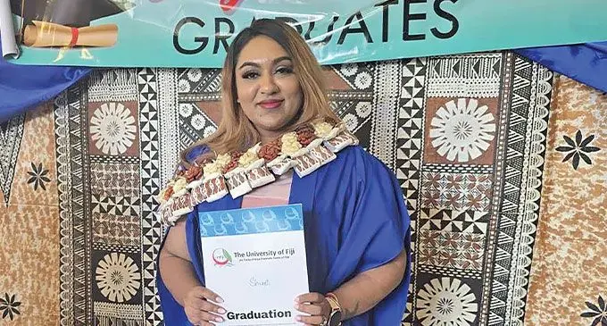 Shreeti Armani Chaudhary with her University of Fiji award. Photo: Waisea Nasokia