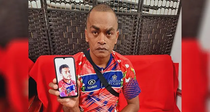 Devastated father, Sitiveni Johnson, 49, shows a picture of his late son, Ilaisa Toroca, 23, who is claimed to have died due to alleged medical negligence. Photo: Sampras Anand.