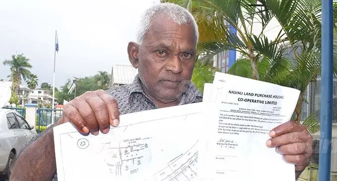 Atish Reddy, 70, a peanut seller from Labasa with the copy of land documents and letter from the Nasinu Land Purchase Cooperative for a piece of land along Ratu Dovi Road in Nepani, Nasinu. Photo: Ronald Kumar