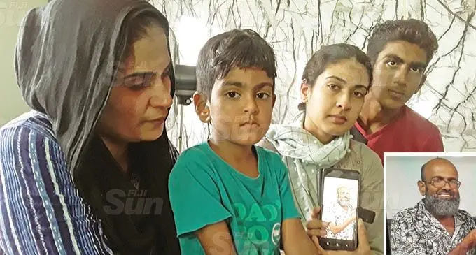 From left: Rukshana Hussain with her children, Sheikh Sajjad Hussain, Rainaa Hussain and Sheikh Shuayb Hussain with a photo of their father, Sheik Sayad Hussain, at their home in Davuilevu on March 22, 2021. Photo: Wati Talebula-Nuku (Inset: Deceased Sheik Sayad Hussain) 