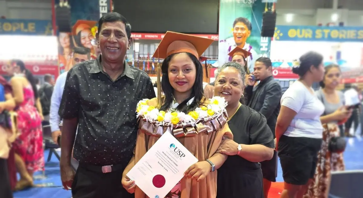 From left: Vinod Chand (father), Noolyn Darshani Chand and Angely Wong Sang (mother) during the University of the South Pacific graduation ceremony at the Vodafone Arena in Suva on April 17, 2026.