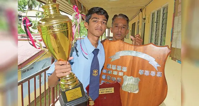 Dilkusha Methodist High School dux of the year, Pranish Lal with his father Pravin Lal on December 13, 2022. Photo: Ronald Kumar