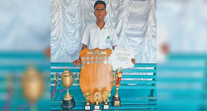 Vunimoli Islamia College head boy, Muizz Mujib Buksh, with his trophies during the school's annual prizegiving ceremony in Labasa on November 27, 2024.