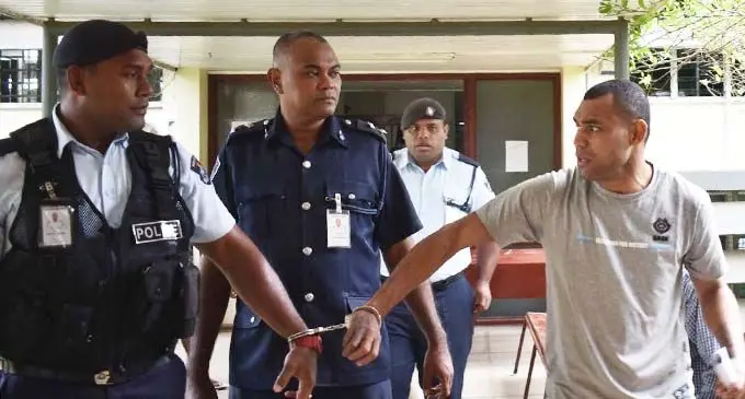Accused Peni Nakarawa escorted by Police officers to the Nadi Magistrates Court on July 3, 2020. Photo: Mereleki Nai