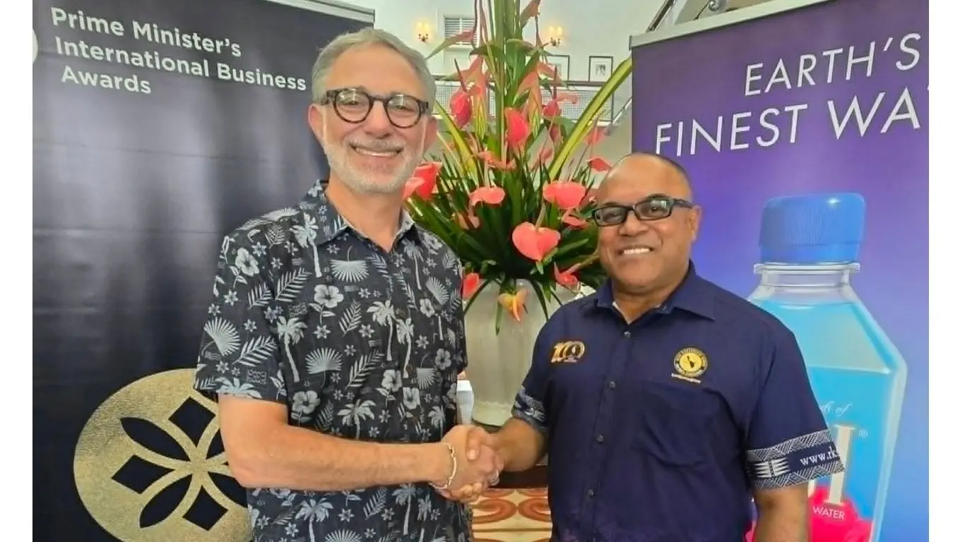 FIJI Water Executive Vice President Craig Cooper (left) and Investment Fiji Board Chairman Filimone Waqabaca after signing the Memorandum of Understanding renewing FIJI Water's sponsorship of the PMIBA 2026 Supreme Award.