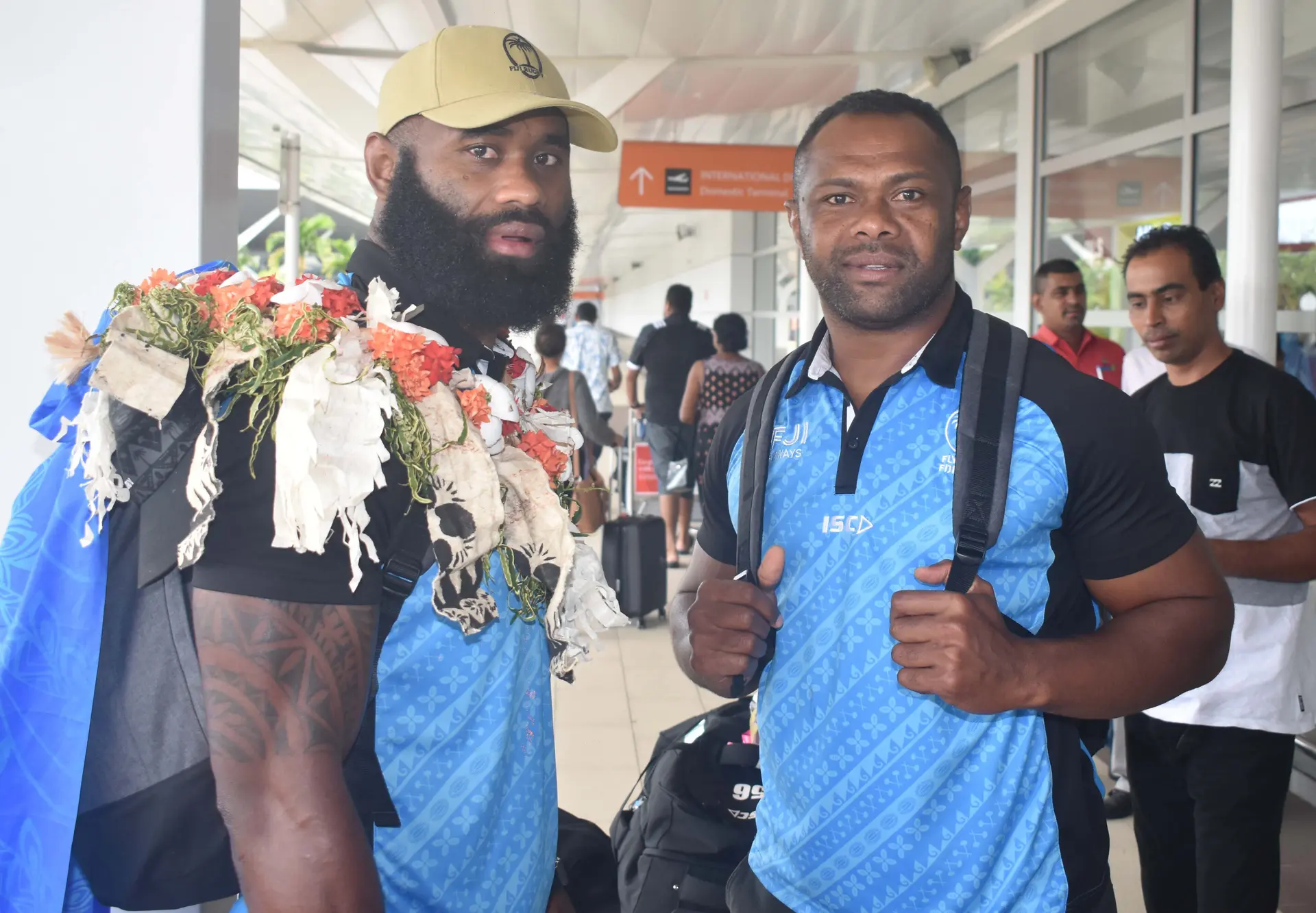 Fiji Airways Flying Fijians Semi Radradra and Vereniki Goneva arrive at the Nadi International Airport on October 15, 2019. Photo: Waisea Nasokia