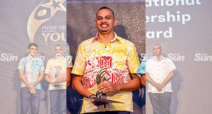 Sivendra Micheal with the Inspirational Leadership award during the Prime Ministers Youth Awards at the Grand Pacific Hotel on May 6,2022. Photo: Leon Lord.