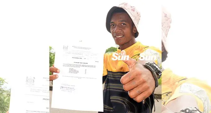 I made it...Navesau Adventist High School year 12 students proudly shows his year 12 marks on April 1, 2022. Photo: Ronald Kumar.
