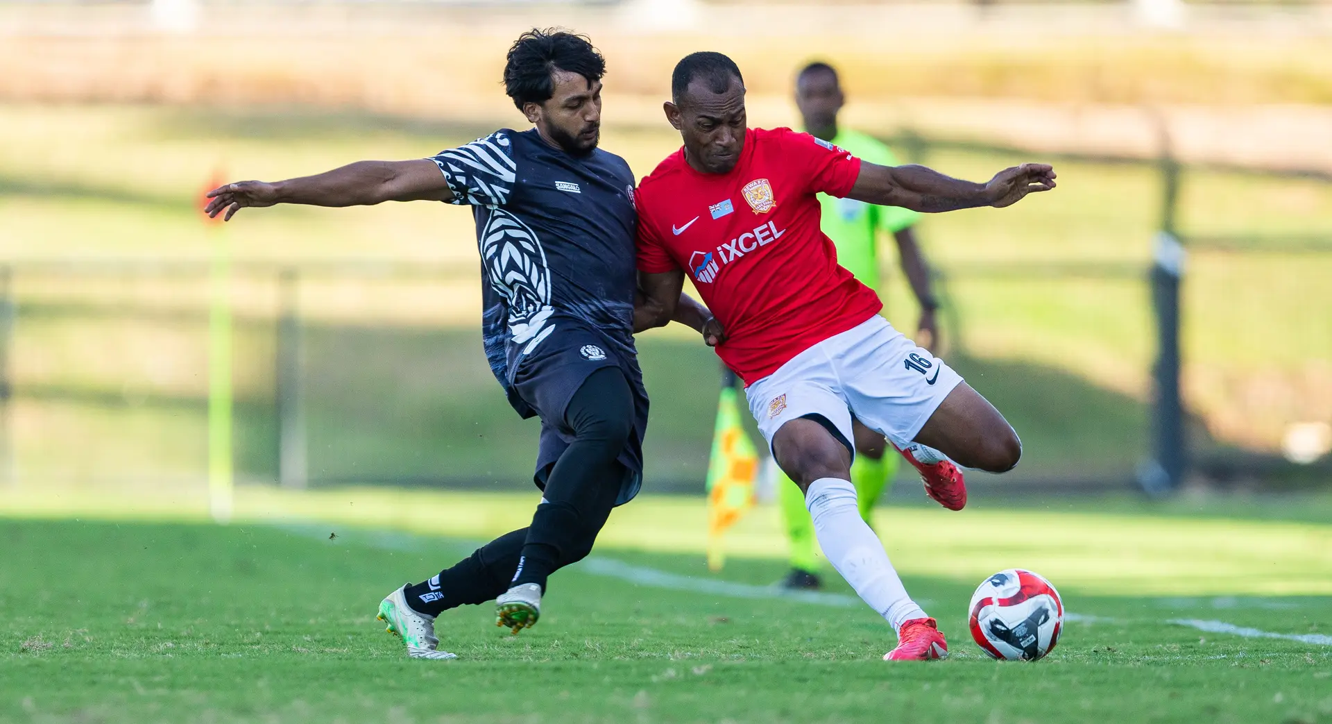 Rewa FC’s Kavaia Rawaqa (right) tussles with Tupapa Maraerenga FC Aadil Kamaldeen during their OFC Men’s Champions League 2026 Group B match at Govind Park, Ba, on August 12, 2026. Photo: OFC Media via Phototek