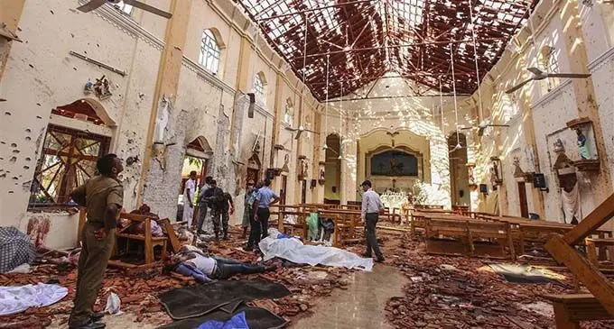 At least 26 people are in custody after a series of explosions killed nearly 300 people in Sri Lanka. 