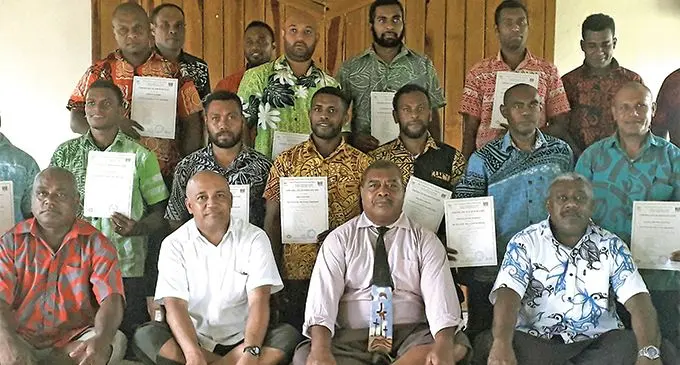The Ovalau Returning Seasonal workers with the Permanent Secretary for Emplyoment, Productivity and Industrial Osea Cawaru (seated, second from left) and officials. Photo: DEPTFO News