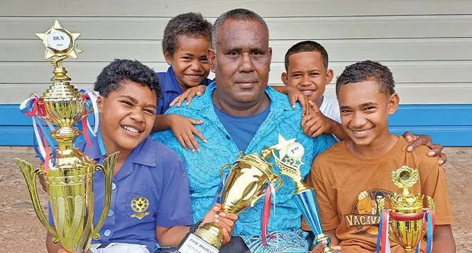 Vudibasoga Catholic School dux Repeka Koroi (left), with father, Epeli Balawa and siblings Eremasi Matana, Leaning Nasucu and Teresia Ciri during the prizegiving in Seaqaqa, Macuata on December 5, 2024. Photo: Shratika Naidu
